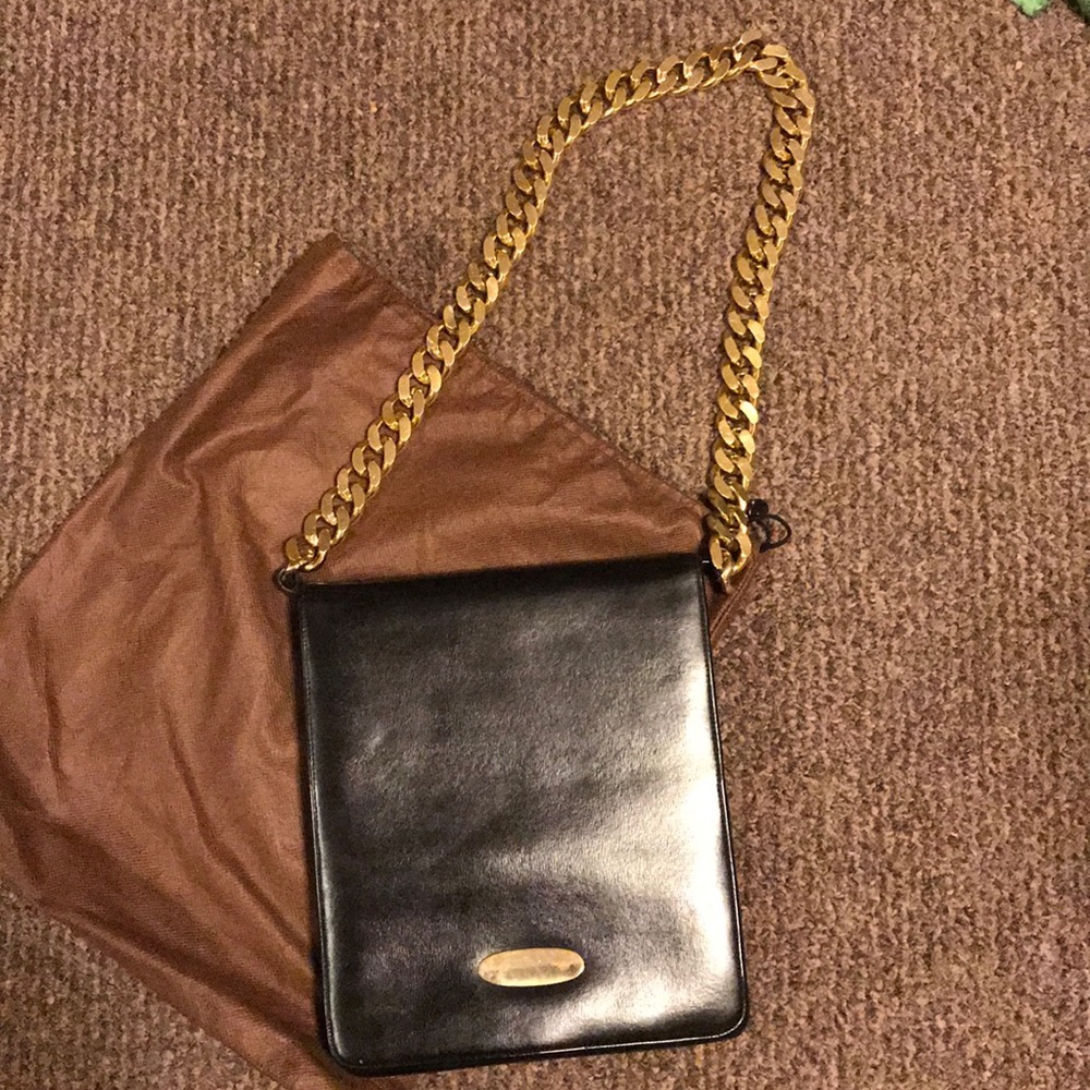 Black bag with gold chain